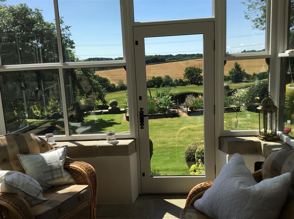 Enjoy the stunning views from the comfort of the conservatory  at Park Corner, Sutton Scarsdale