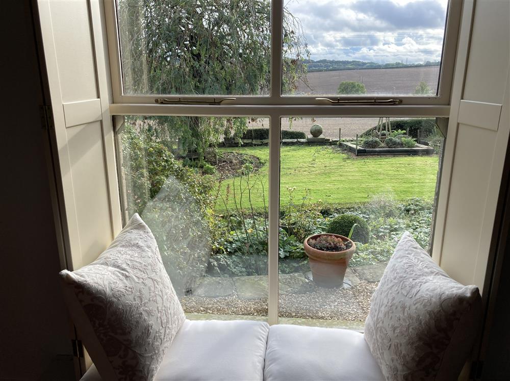 Relax with your favourite book and soak in the countryside views in the cost window seat  at Park Corner, Sutton Scarsdale