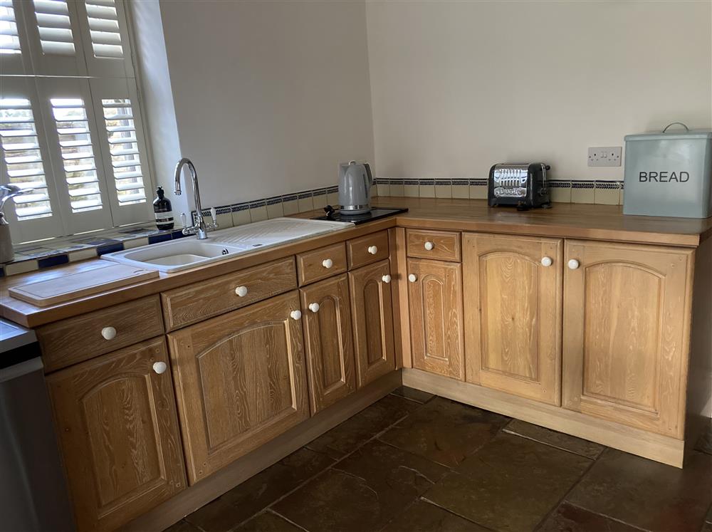 The well-equipped kitchen area at Park Corner, Sutton Scarsdale