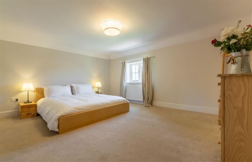 First floor: Master bedroom with 6ft super king size bed at Park Cottage, Fring near Kings Lynn