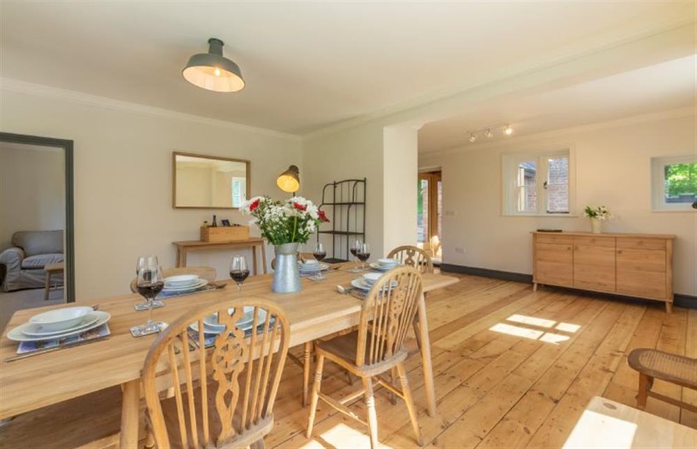 Ground floor: Dining room with feature wood floor at Park Cottage, Fring near Kings Lynn