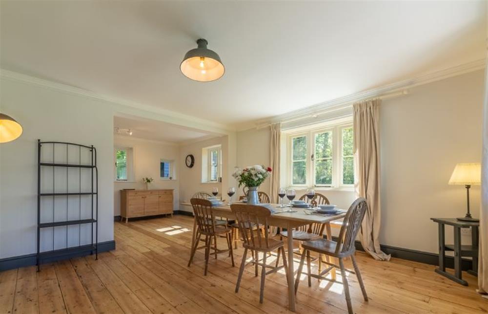 Ground floor: Dining room with table and seating for six at Park Cottage, Fring near Kings Lynn