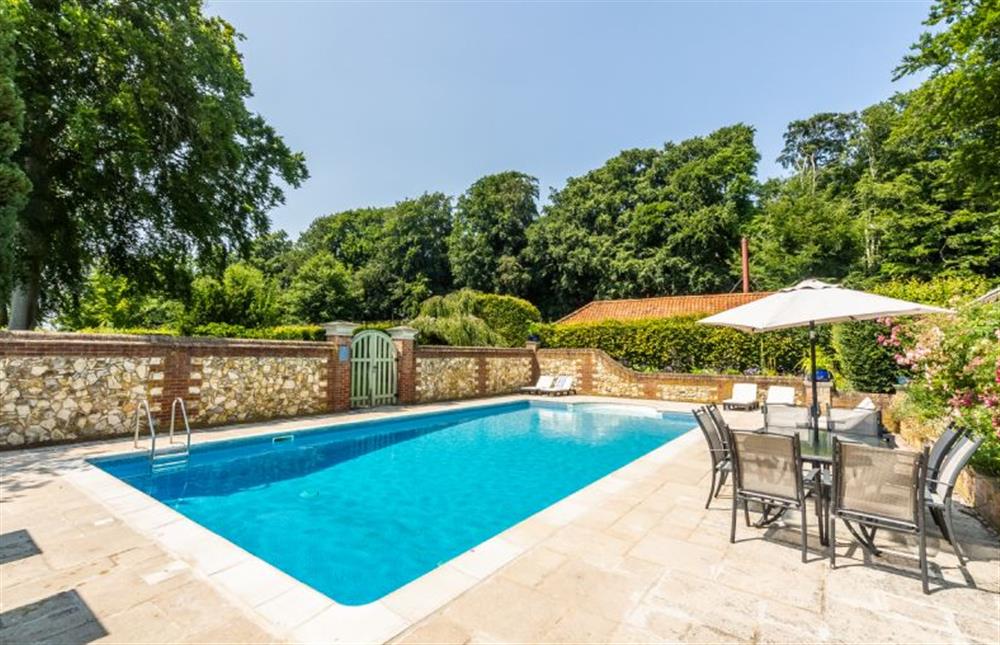 Heated swimming pool in the summer months at Park Cottage, Fring near Kings Lynn