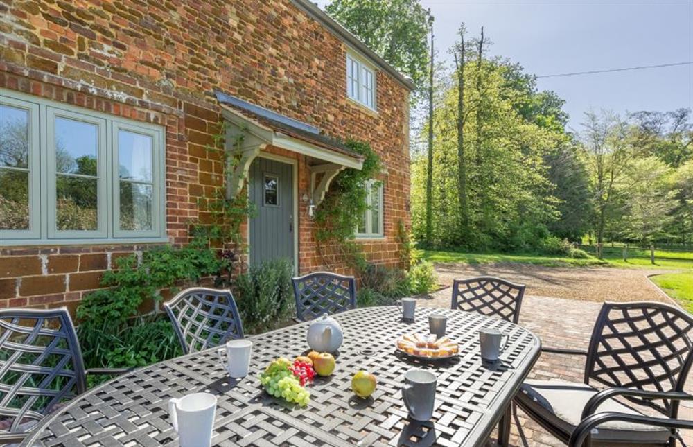 Large garden with table and seating for eight at Park Cottage, Fring near Kings Lynn