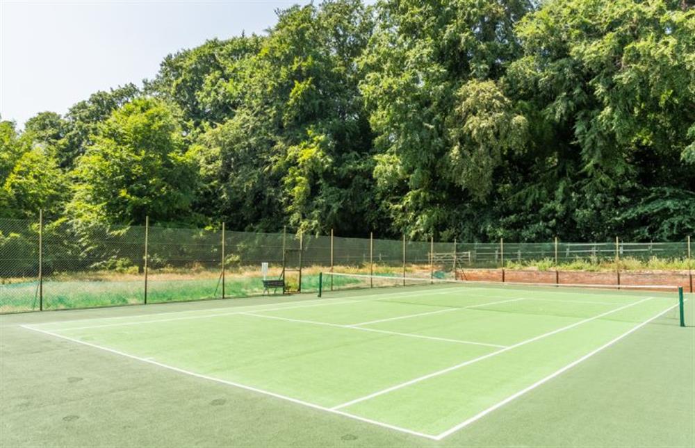 Tennis court for guest use at Park Cottage, Fring near Kings Lynn