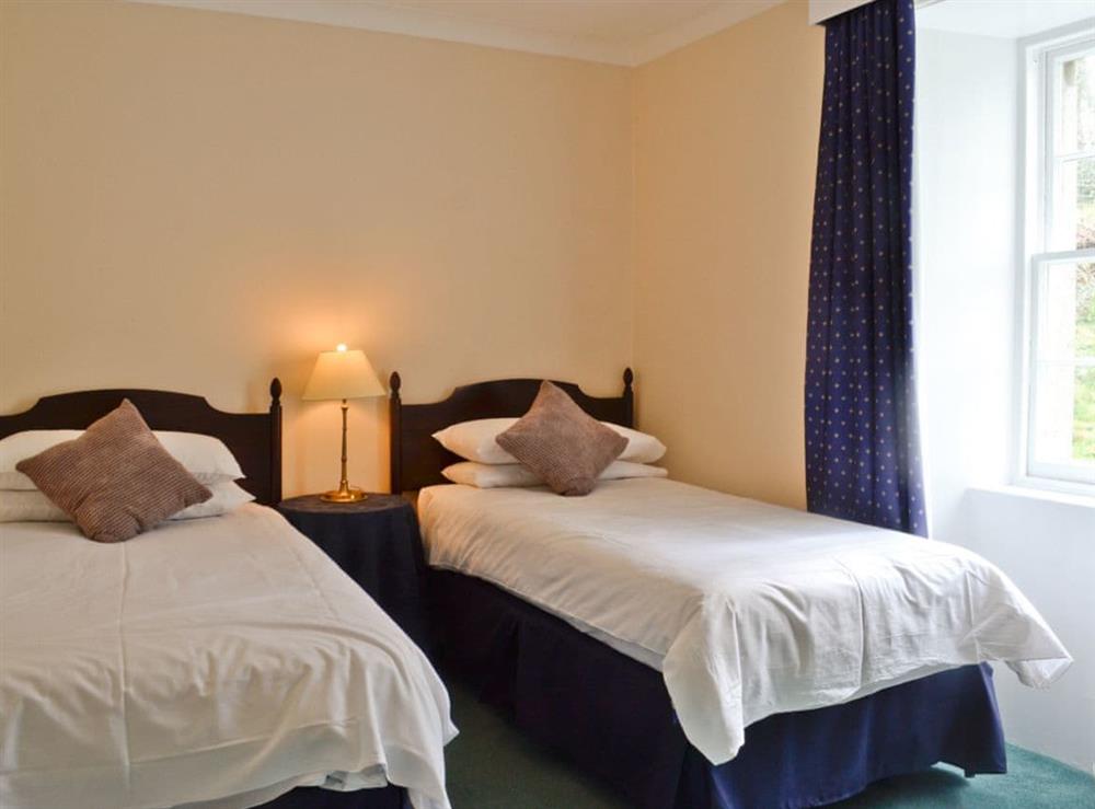 Twin bedroom at Park Cottage in Gatehouse of Fleet, Kirkcudbrightshire