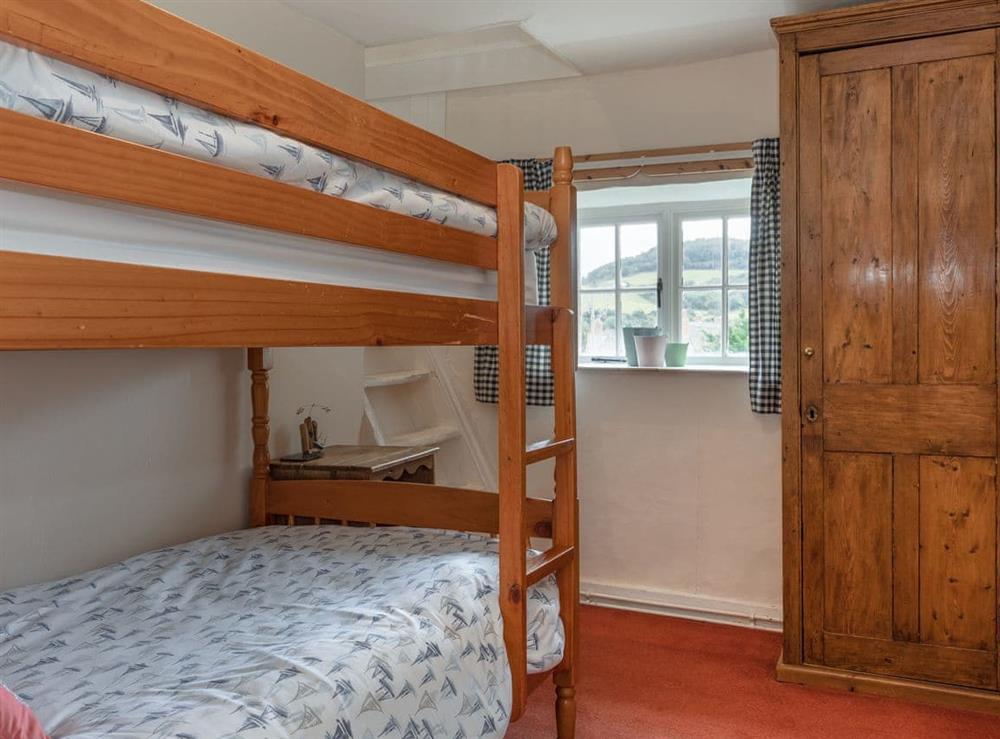 Bunk bedroom at Park Farmhouse in Chideock, near Bridport, Dorset