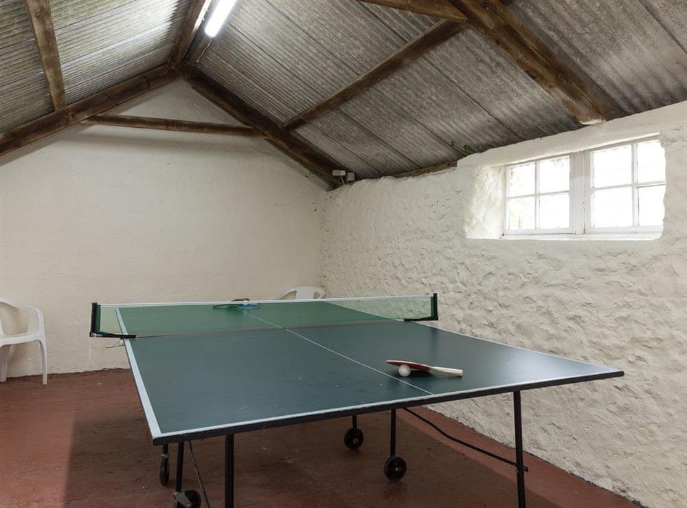 Games room with table tennis at Park Farmhouse in Chideock, near Bridport, Dorset