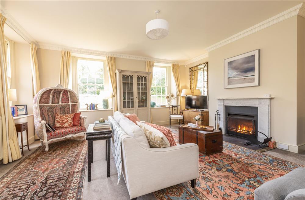 Ground floor sitting room with open fire