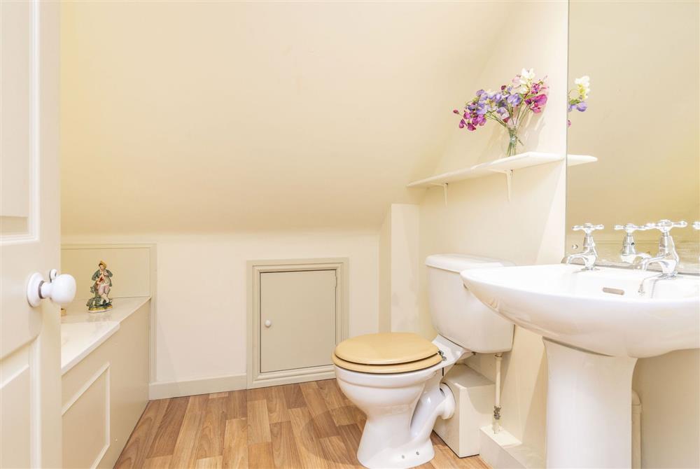Second floor family bathroom with bath and shower over at Park House, Winterborne Came
