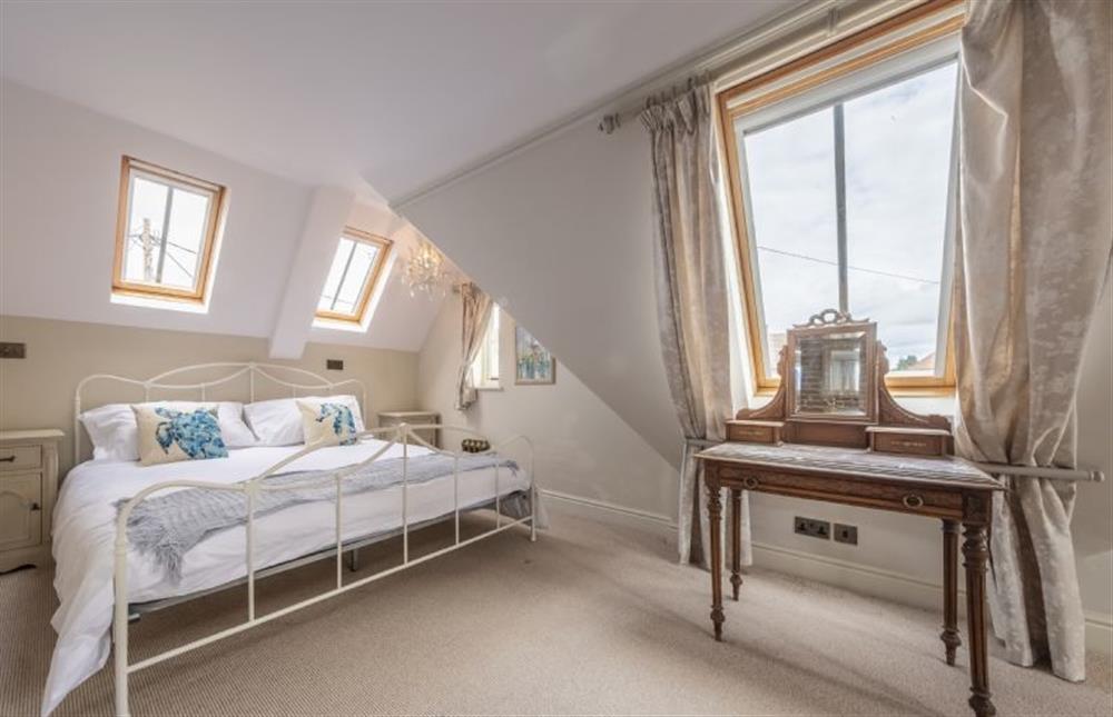 Master bedroom with superking-sized bed at Park Lodge, Snettisham near Kings Lynn