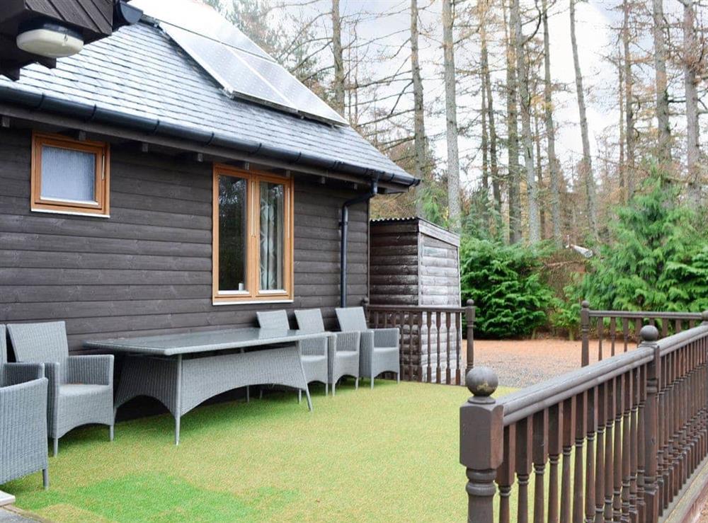 Astroturfed patio area with furniture at Park Lodge in Strachan, near Banchory, Kincardineshire