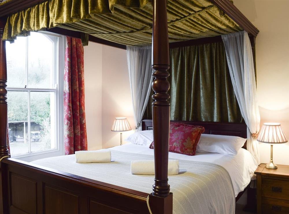 Four poster bedroom at Park Place in Arundel, West Sussex