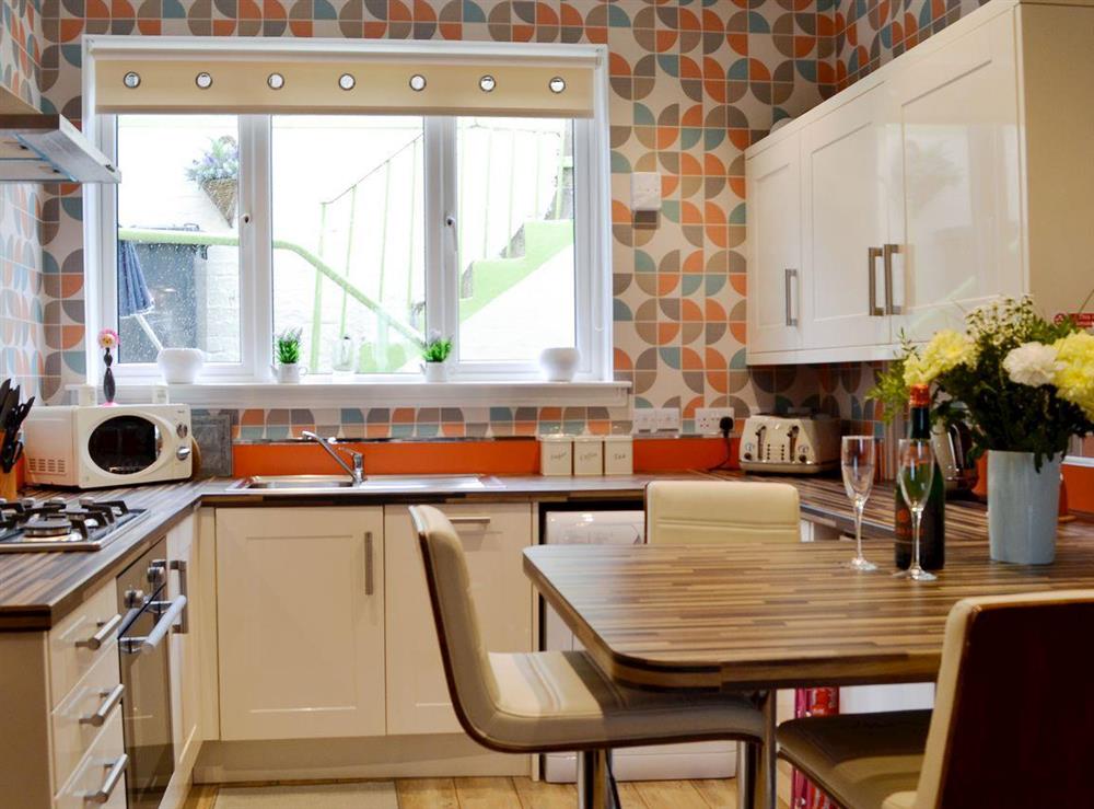 Charming kitchen/ dining area at Park View Cottage in Stranraer, Dumfries and Galloway, Wigtownshire
