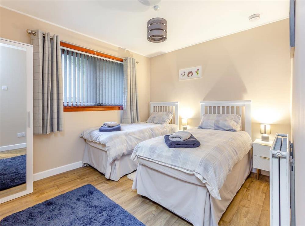 Twin bedroom at Parkhill Cottage in Kildary, Ross-Shire