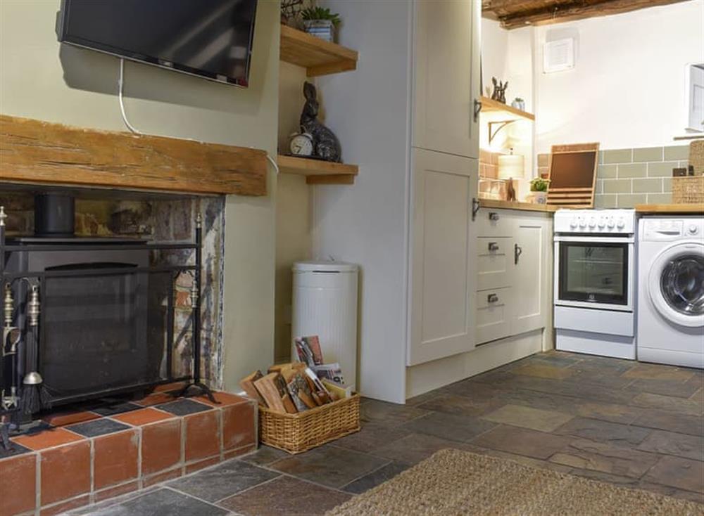 Warming wood burner in the ground floor living space at Parky Mews in Richmond, Yorkshire, North Yorkshire