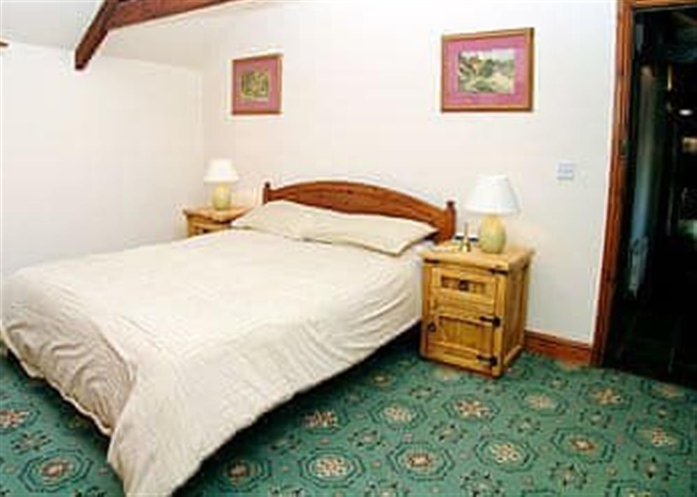 Master bedroom at Parlour Cottage in Evershot, Dorchester., Dorset