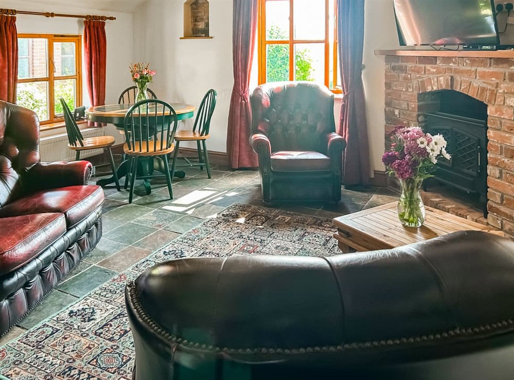 Living room/dining room at Parlour Cottage in Evershot, near Dorchester, Dorset