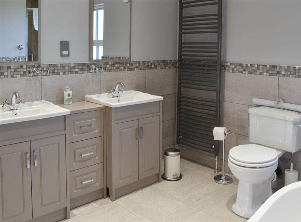 Bathroom with stand alone bath at Pasture House in Primrose Valley, near Filey, North Yorkshire