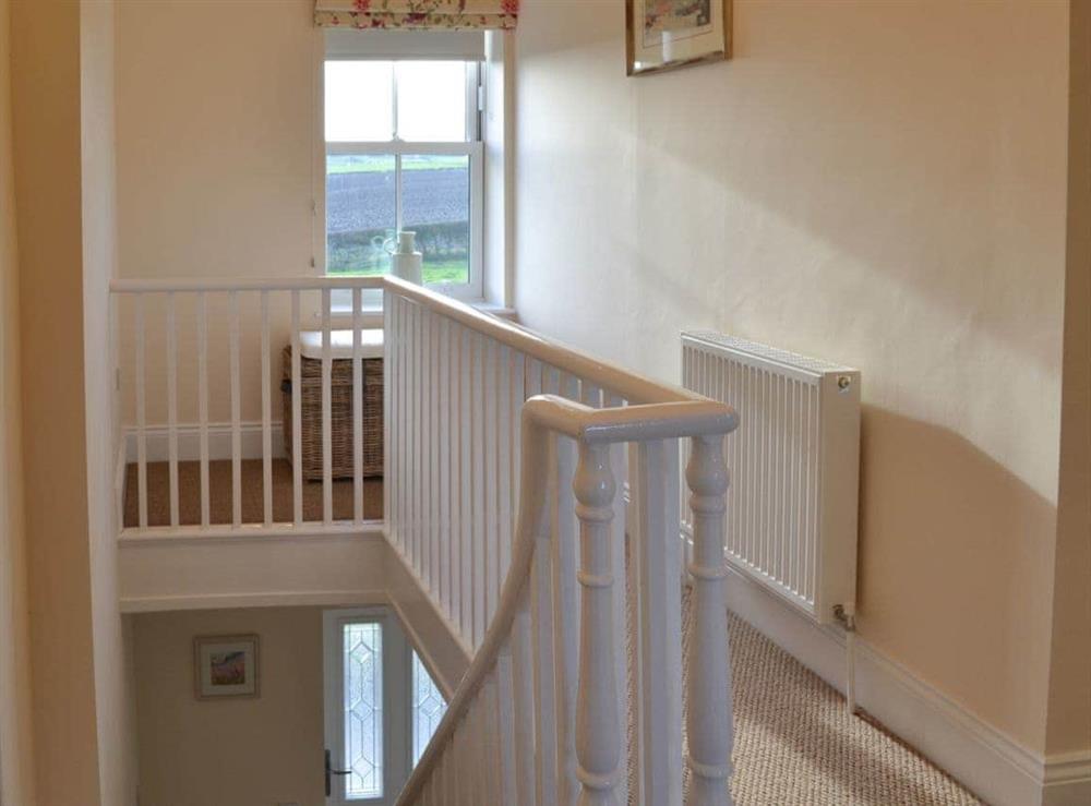 Hallway & stairs at Pasture House in Primrose Valley, near Filey, North Yorkshire