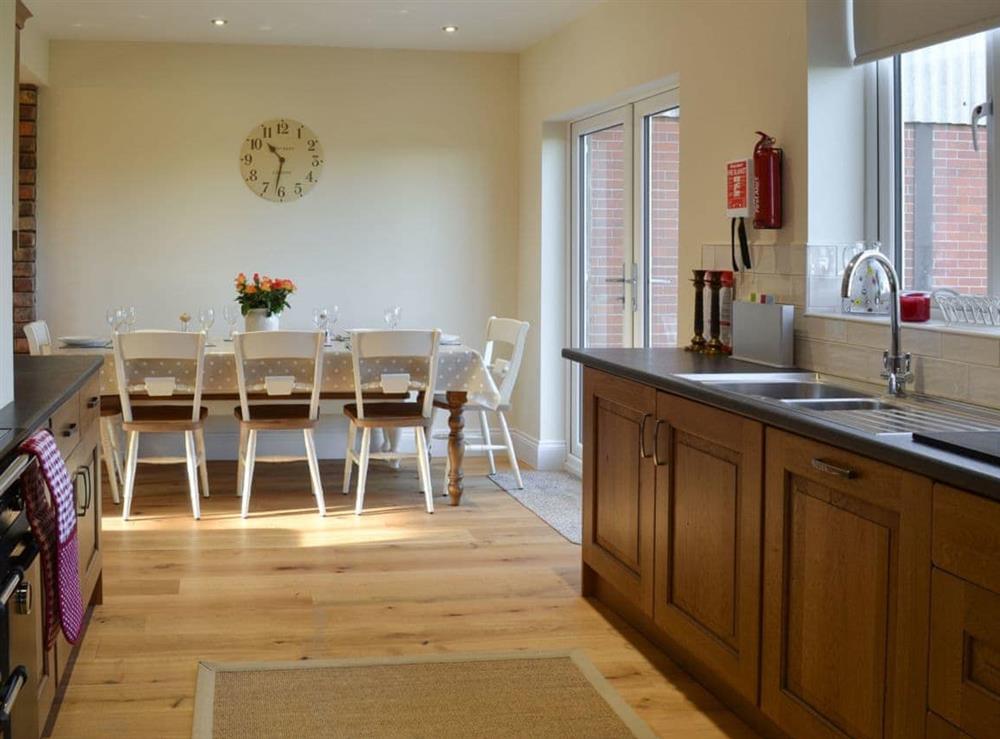 Kitchen & dining area at Pasture House in Primrose Valley, near Filey, North Yorkshire