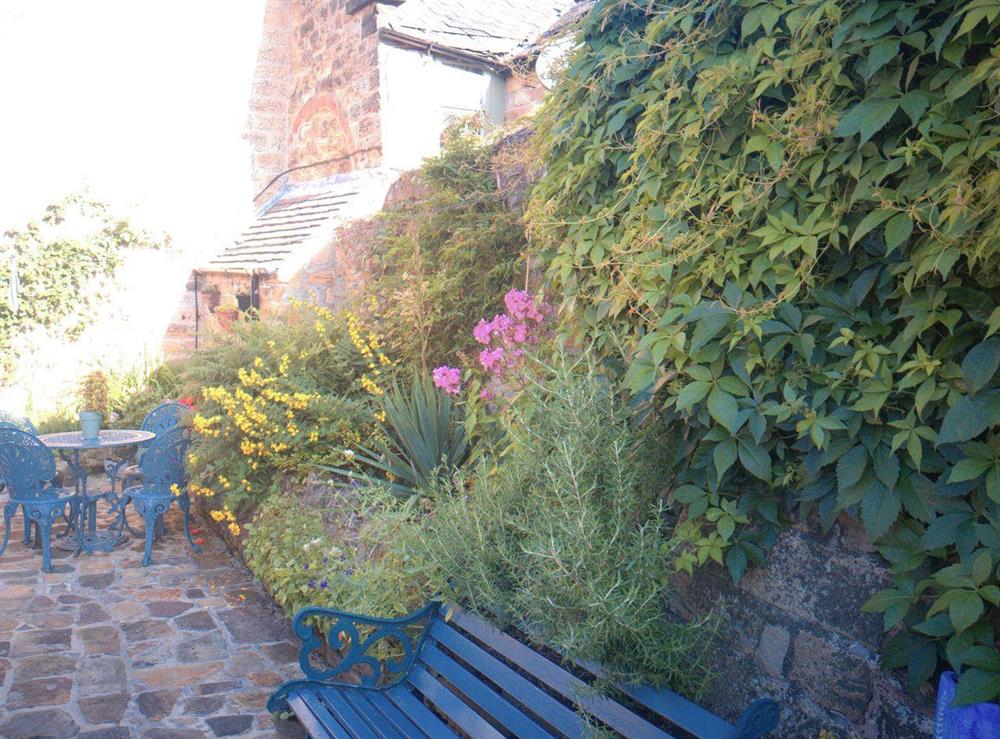 Courtyard garden with outdoor furniture at Pathways in Higham, near Alfreton, Derbyshire
