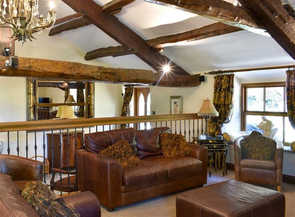 Cosy living area with open fire (photo 2) at Patton Mill in Patton, near Kendal, Cumbria
