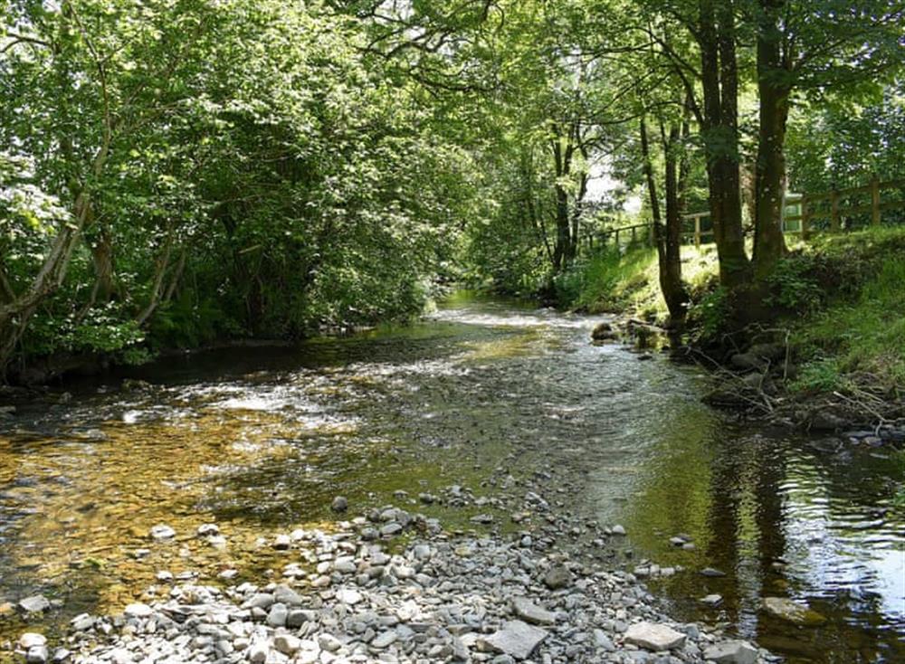 Situated beside the River Mint (photo 2) at Patton Mill in Patton, near Kendal, Cumbria