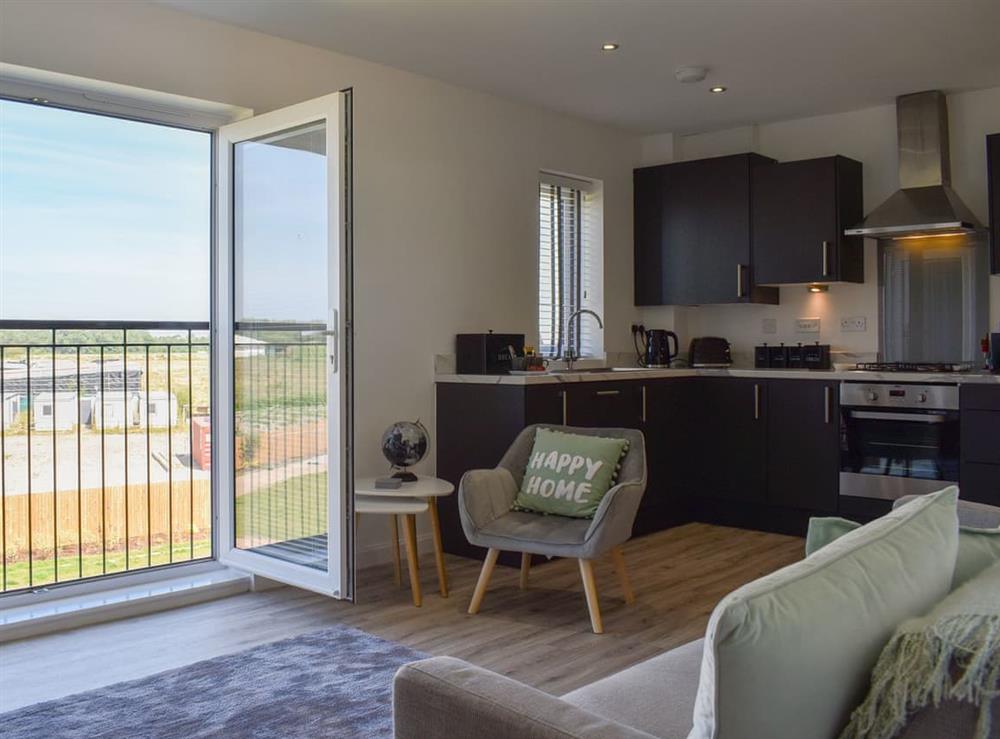 Open plan living space at Pavilion Gardens Apartment in Southport, Merseyside