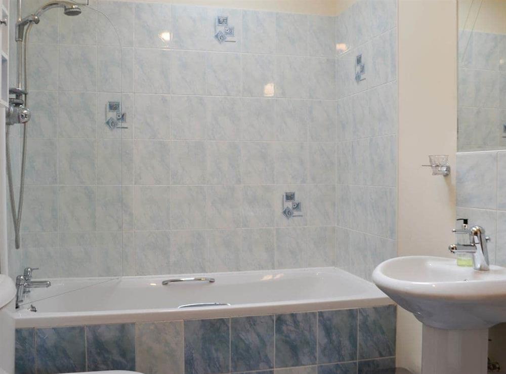 Bathroom with over-bath shower at Peace in Sorbie, Newton Stewart., Wigtownshire