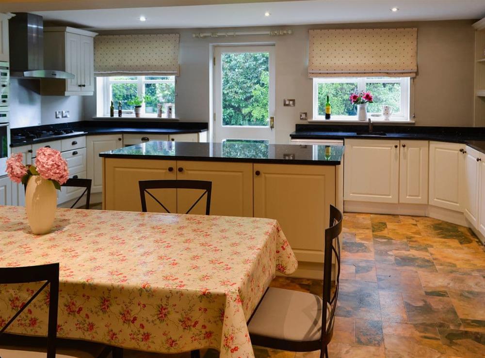 Large kitchen and dining area at Peach Cottage in Wool, near Wareham, Dorset, England