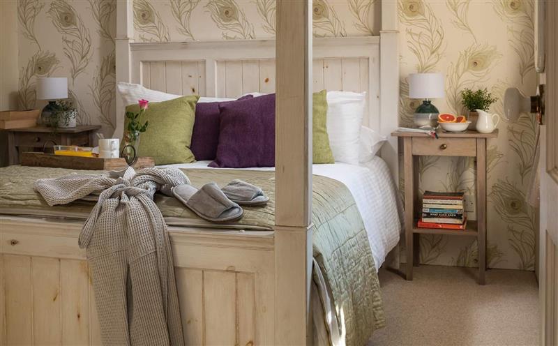 This is a bedroom at Peacock Cottage, Combe Martin