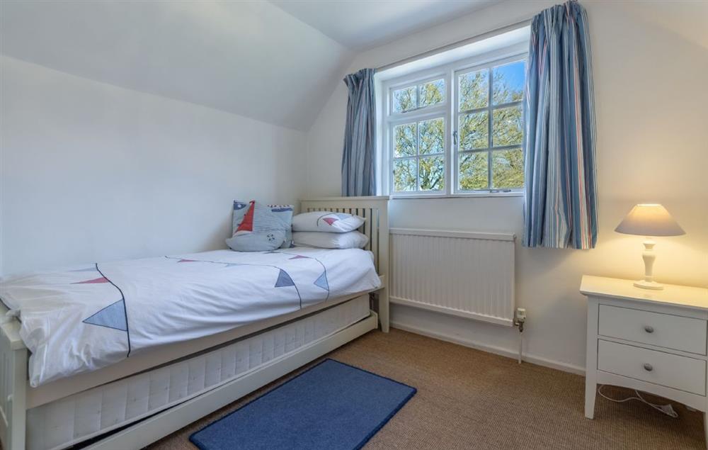 Bedroom three with 3’ single bed and truckle bed for an additional child at Peak Hill Cottage, Theberton