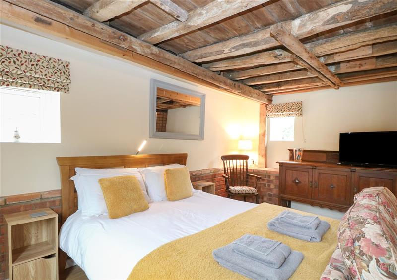 One of the bedrooms at Pear Tree Barn, Lessingham near Stalham