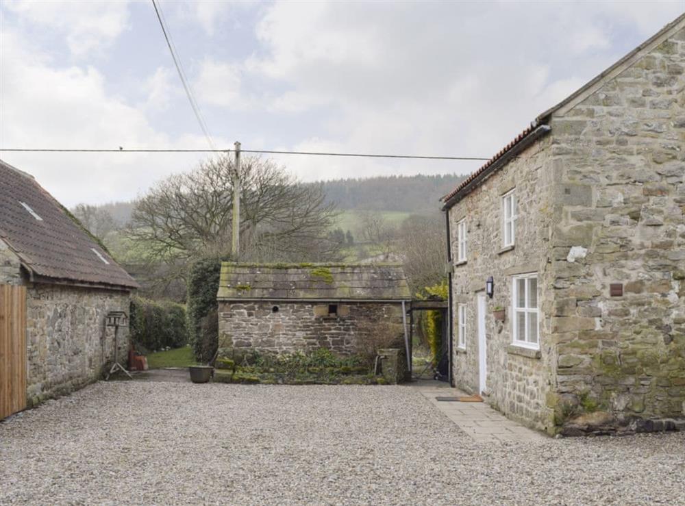 Gravelled courtyard with access to garden at Pear Tree Cottage and The Granary in East Witton, near Leyburn, North Yorkshire