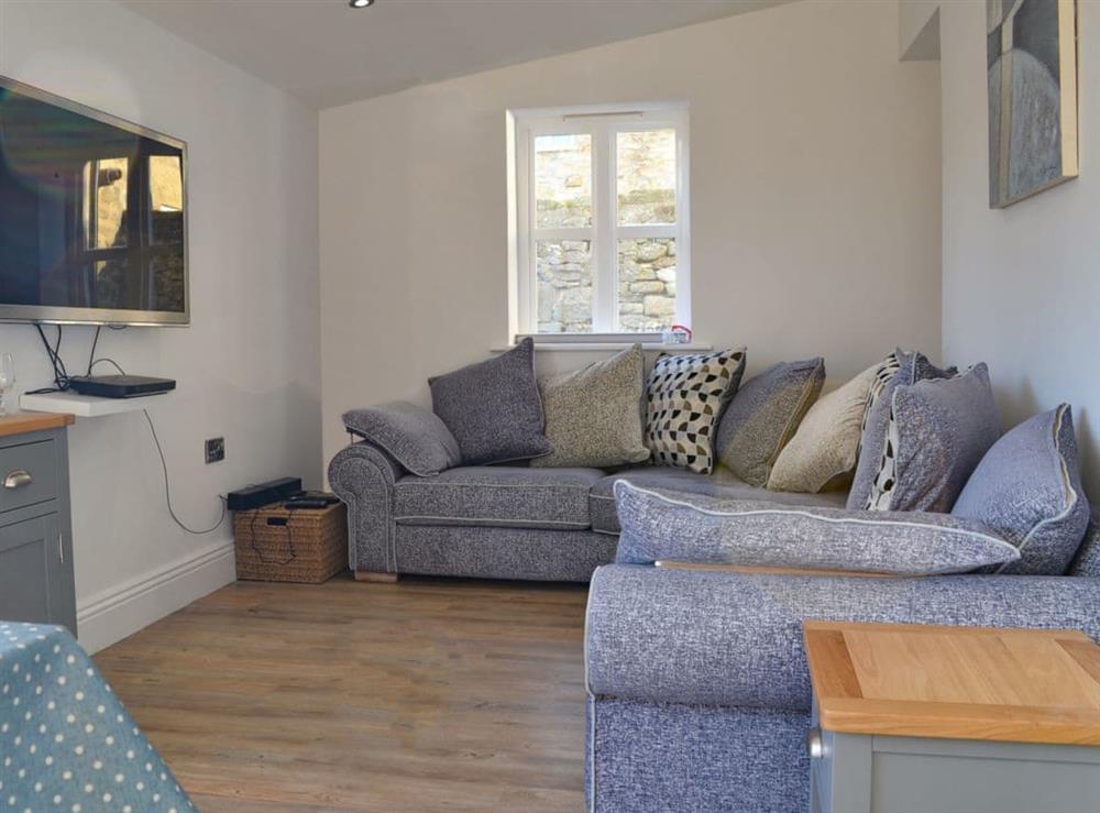Separate tv area and snug as part of the kitchen/diner at Pear Tree Cottage and The Granary in East Witton, near Leyburn, North Yorkshire