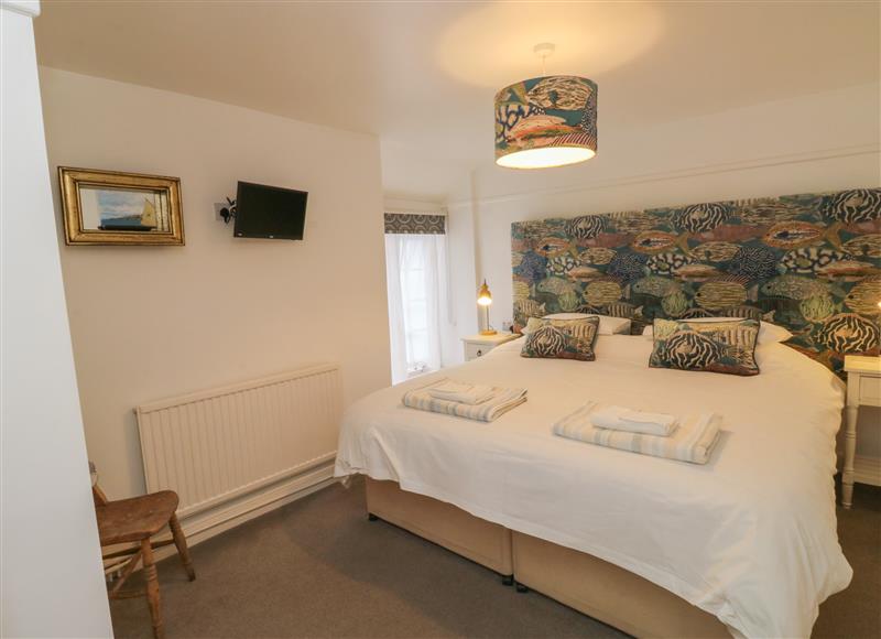 A bedroom in Pear Tree Cottage at Pear Tree Cottage, Appledore