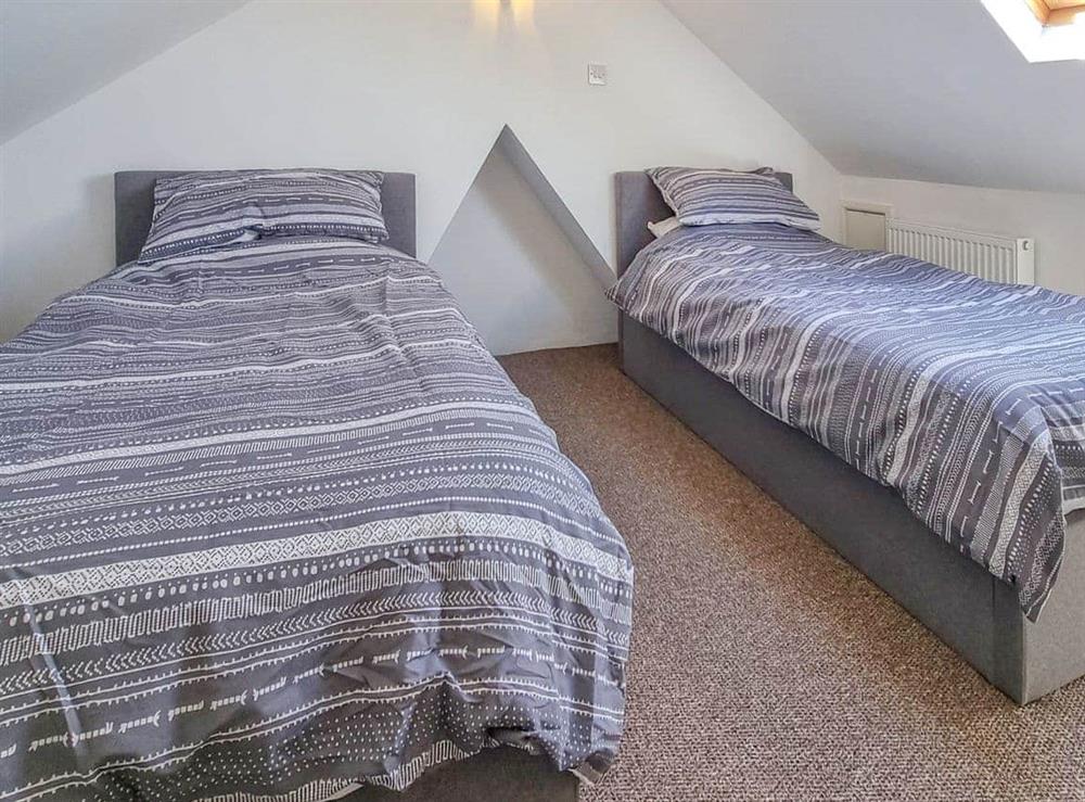 Twin bedroom at Pear Tree Cottage in Bath, Avon