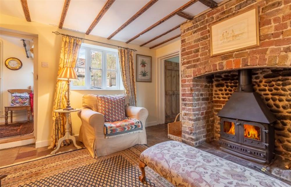 Light the wood burning stove and you will be extra cosy at Pear Tree Cottage, Blakeney near Holt