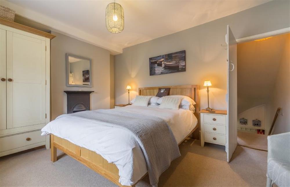 First floor: Master bedroom at Pear Tree Cottage, Holme-next-the-Sea near Hunstanton