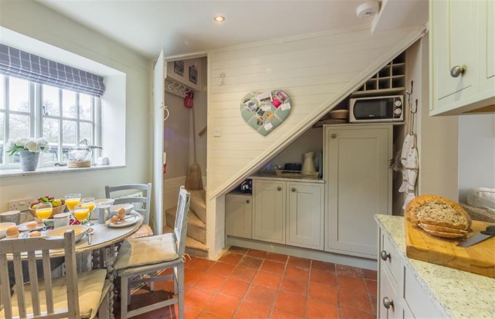 Ground floor: Dining kitchen with stairs to first floor at Pear Tree Cottage, Holme-next-the-Sea near Hunstanton