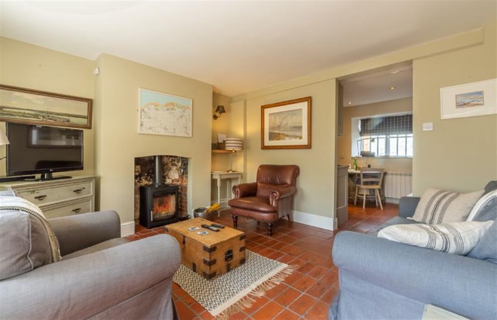 Ground floor: Sitting room with wood burning stove at Pear Tree Cottage, Holme-next-the-Sea near Hunstanton