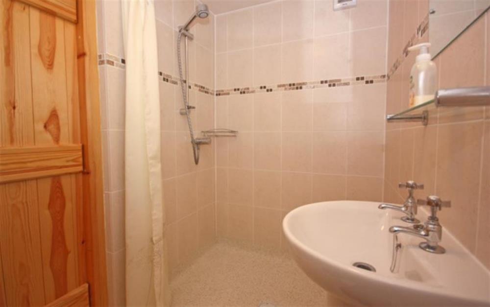 The shower room on the ground floor next to the single bedroom at Pear Tree Cottage in Honiton