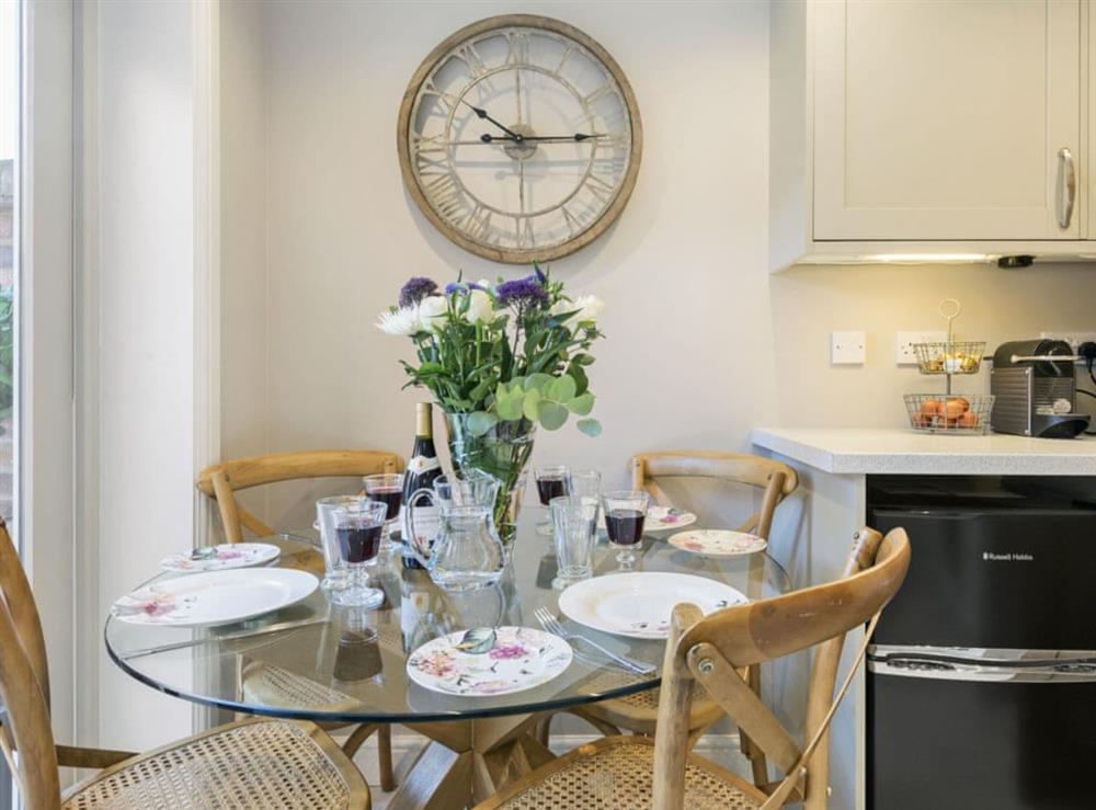 Elegant dining area in kitchen at Pear Tree Cottage in Louth, Lincolnshire, England