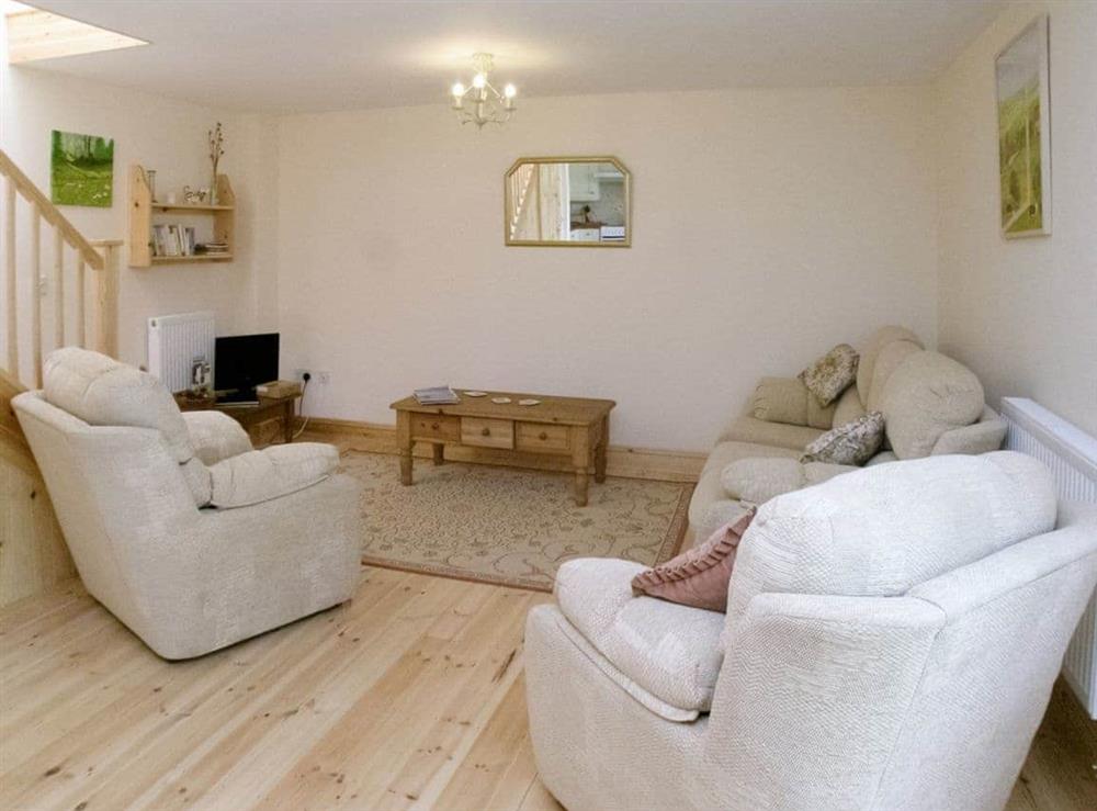 Living room at Pear Tree Cottage in St Mellion, Saltash, Cornwall