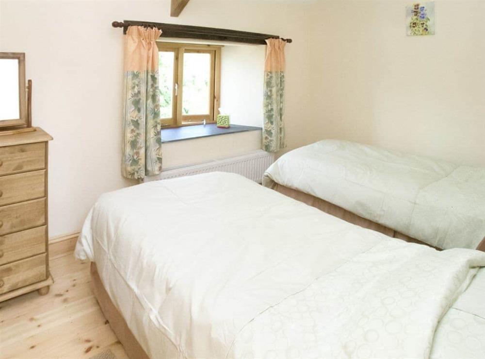 Twin bedroom at Pear Tree Cottage in St Mellion, Saltash, Cornwall