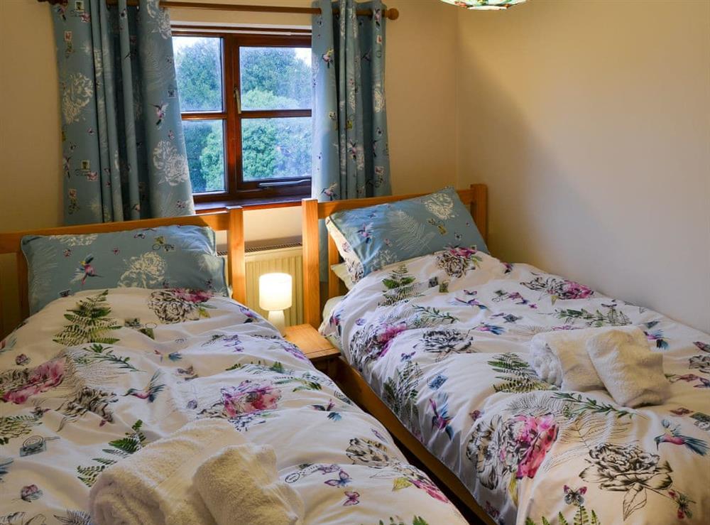 Twin bedroom at Pear Tree Cottage in Stalham, near Norwich, Norfolk