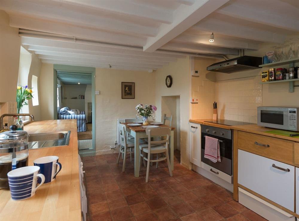 Kitchen with dining area (photo 2) at Pear Tree Cottage in Wenhaston, near Southwold, Suffolk