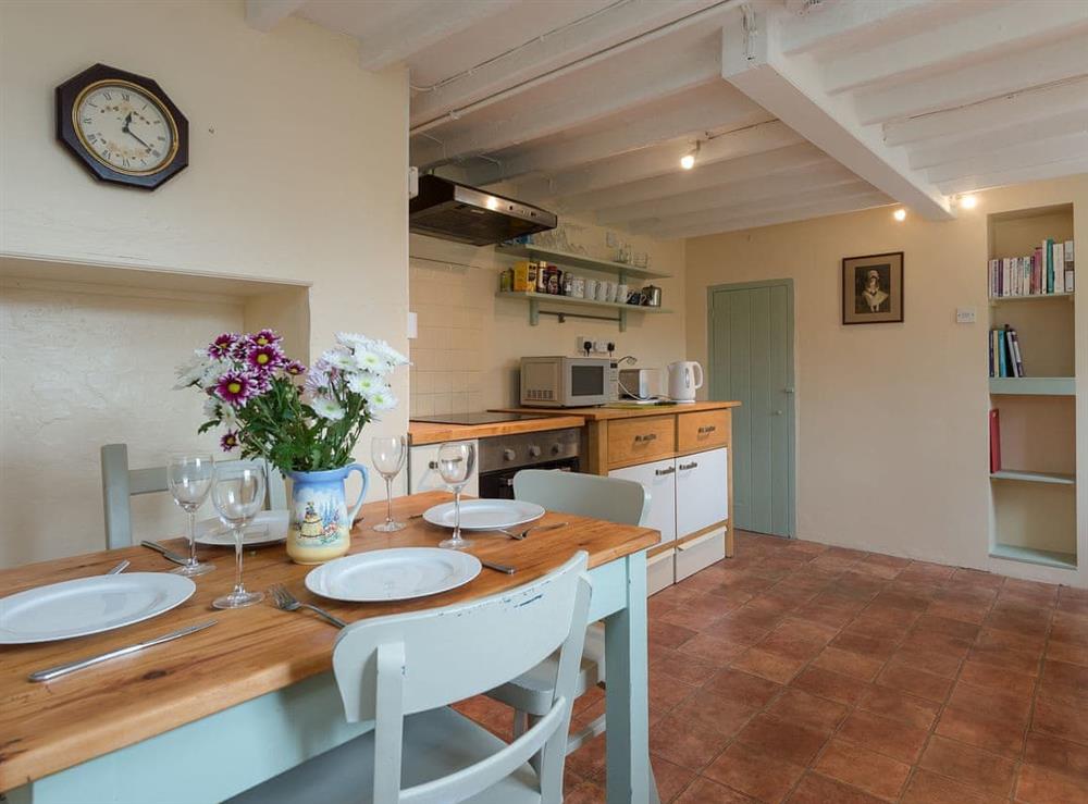 Kitchen with dining area at Pear Tree Cottage in Wenhaston, near Southwold, Suffolk