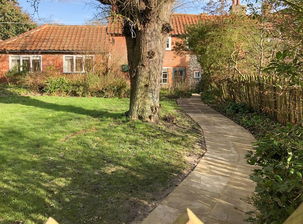 Stone path to the cottage and annexe at Pear Tree Cottage in Wenhaston, near Southwold, Suffolk